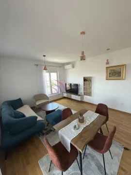 Living room with dining area and sofa set. - image 3