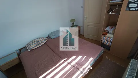 Small bedroom with a double bed, wardrobe, and a bedside table. - image 8