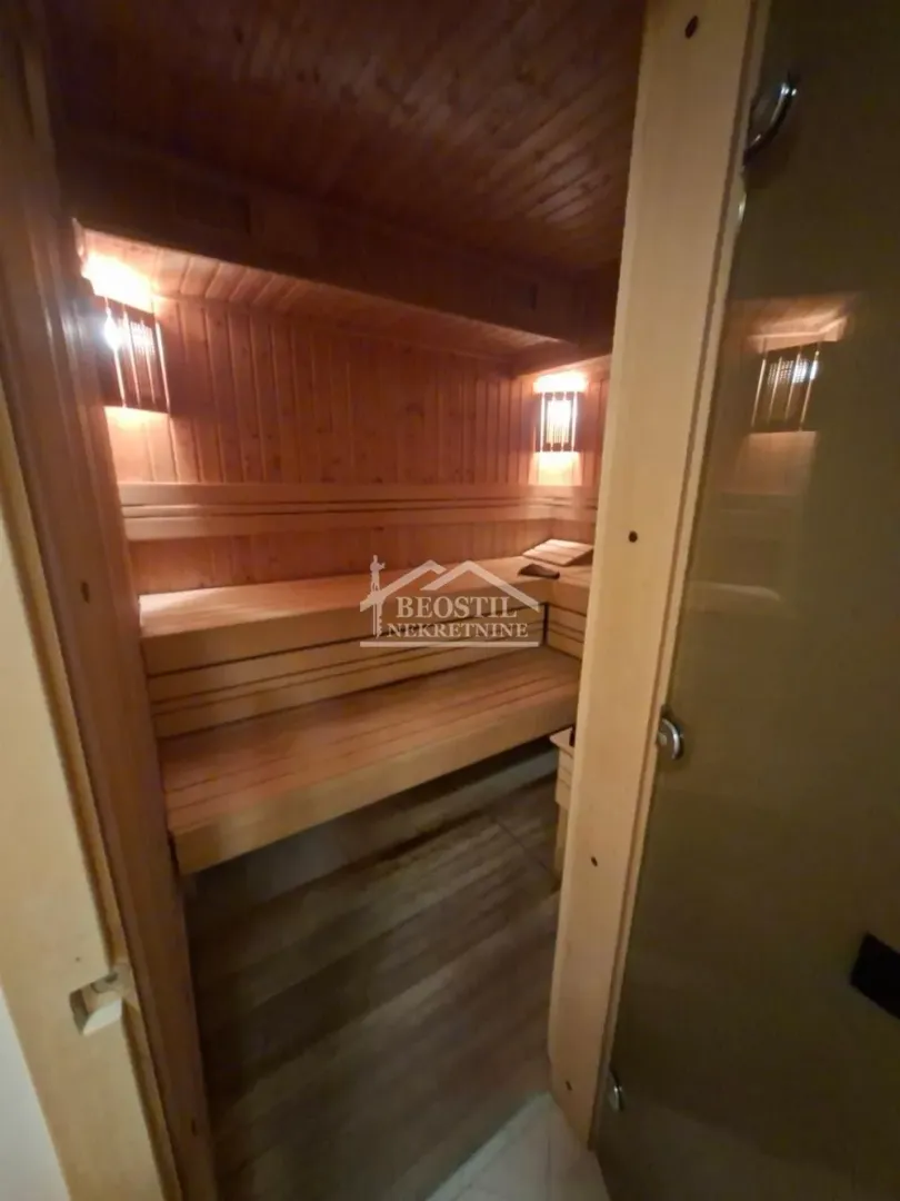 View of a private wooden sauna inside the property.