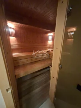 View of a private wooden sauna inside the property. - image 6