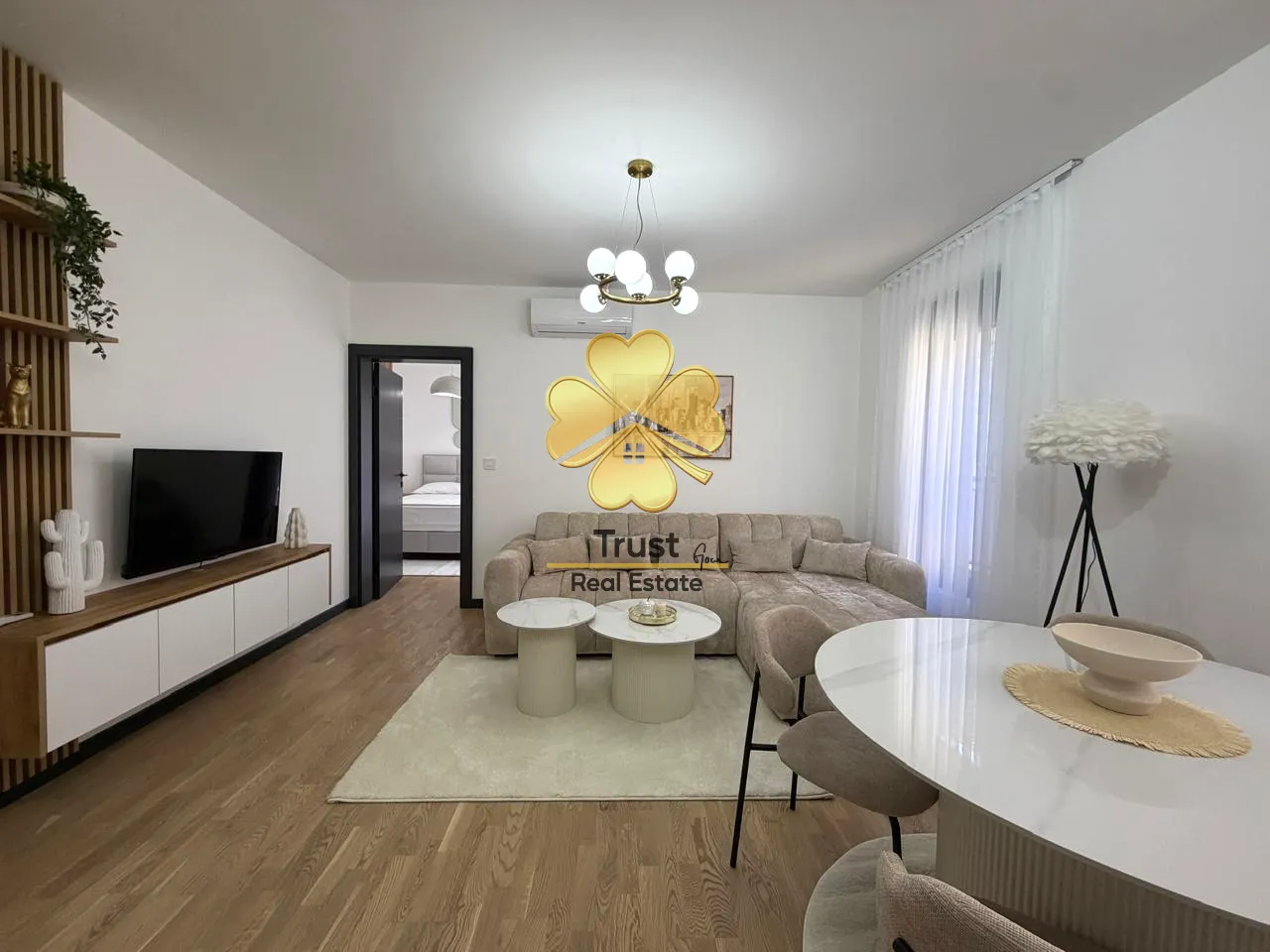 Modern and bright living room with a dining area.