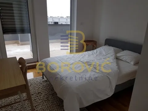 Bedroom with a double bed and access to the terrace. - image 11