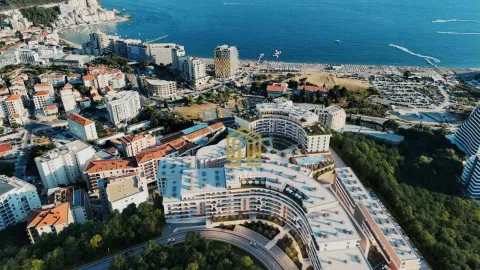 Pogled iz vazduha na stambeni kompleks blizu obale i plaže. - image 2