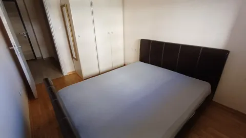 Bedroom with a double bed and a fitted wardrobe. - image 8