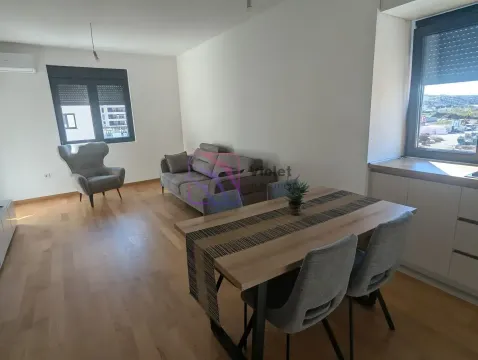 Living room with a dining area and seating furniture. - image 11