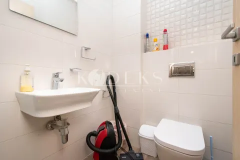 Small bathroom with a sink and toilet. - image 8