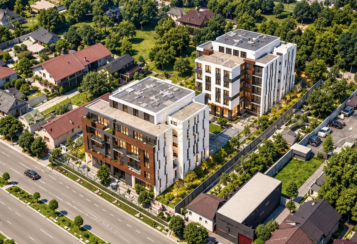 Aerial view of modern residential buildings and the surrounding neighborhood.