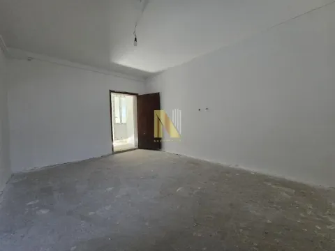 Empty room in grey phase with an open door. - image 3