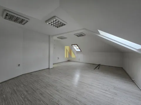 Empty attic room with laminate flooring and skylights. - image 14