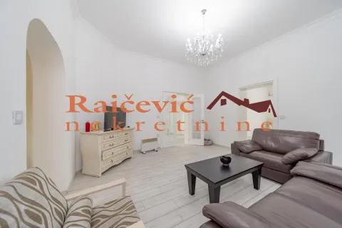 Spacious living room with a sofa set and a TV cabinet. - image 14