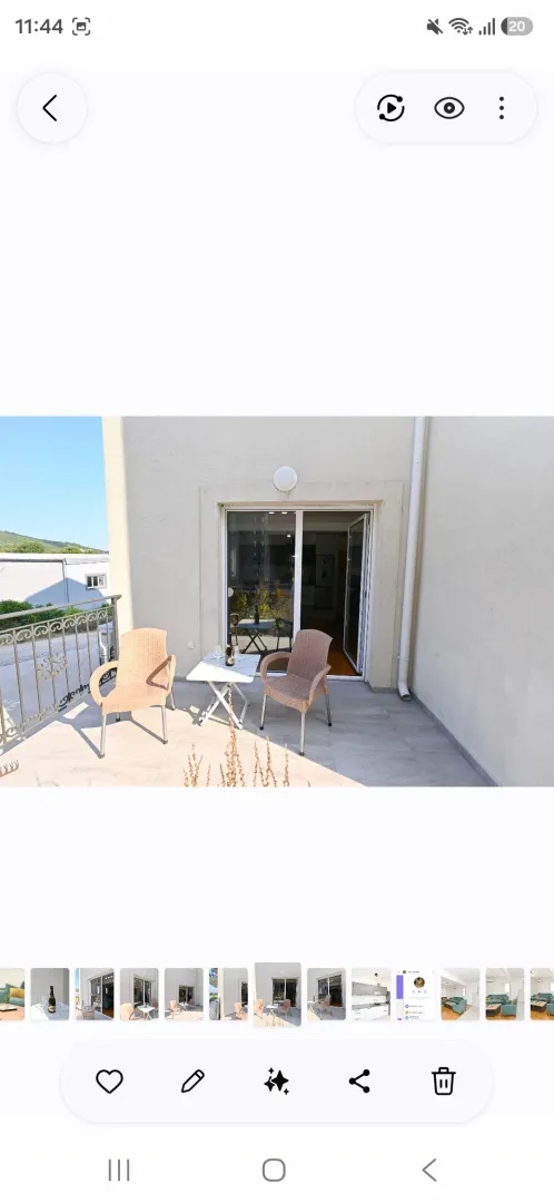 Furnished terrace with a table and chairs.