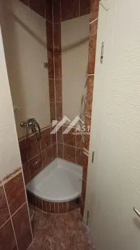 Bathroom with a tiled shower cabin. - image 2