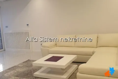 Living room with a corner sofa and a coffee table. - image 2