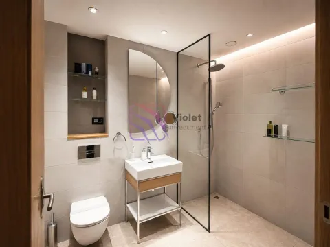 Moderno opremljeno kupatilo sa tuš kabinom, umivaonikom i ugradnom wc šoljom. - image 10