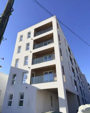 Exterior view of a modern residential building. - image 2