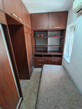 Small bedroom with fitted wardrobes and a bed. - image 10