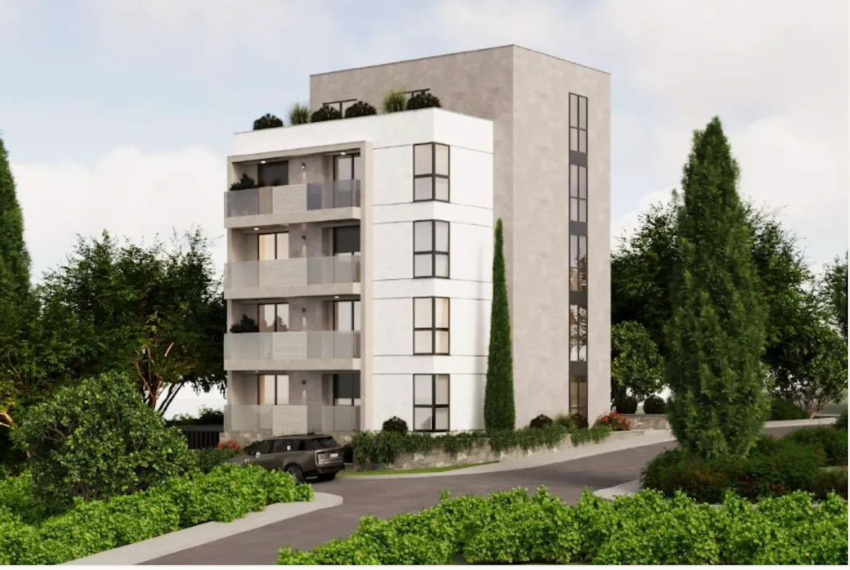 Spoljašnji izgled moderne stambene zgrade sa terasama i uređenim okruženjem.