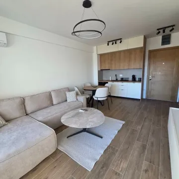 Modern living room connected with the dining area and kitchen. - image 2