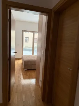 View from the hallway into the bedroom with access to the terrace. - image 9