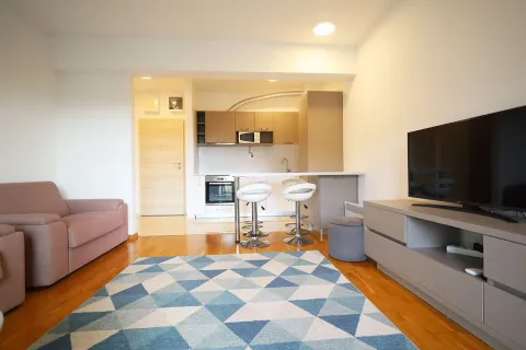 Living room connected to the kitchen and dining area. - image 13