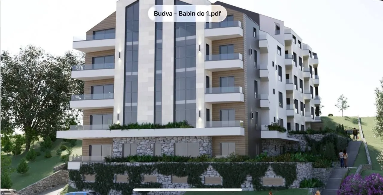 Spoljašnji izgled moderne stambene zgrade sa terasama.