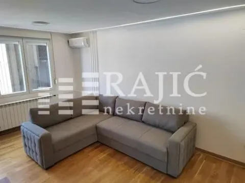 Corner sofa in a bright living room. - image 4