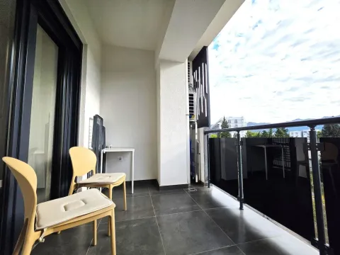 Covered terrace with chairs and a view of the surroundings. - image 13