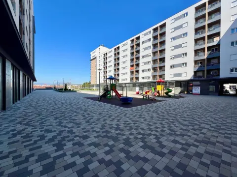 Moderne stambene zgrade sa popločanim dvorištem i igralištem. - image 17