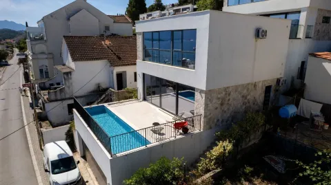 Aerial view of a modern house with a swimming pool and terrace. - image 5