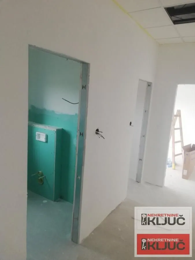 View of rooms under construction with open door frames.