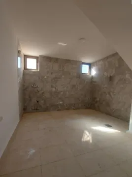 Empty bathroom with ceramic tiles and windows. - image 14