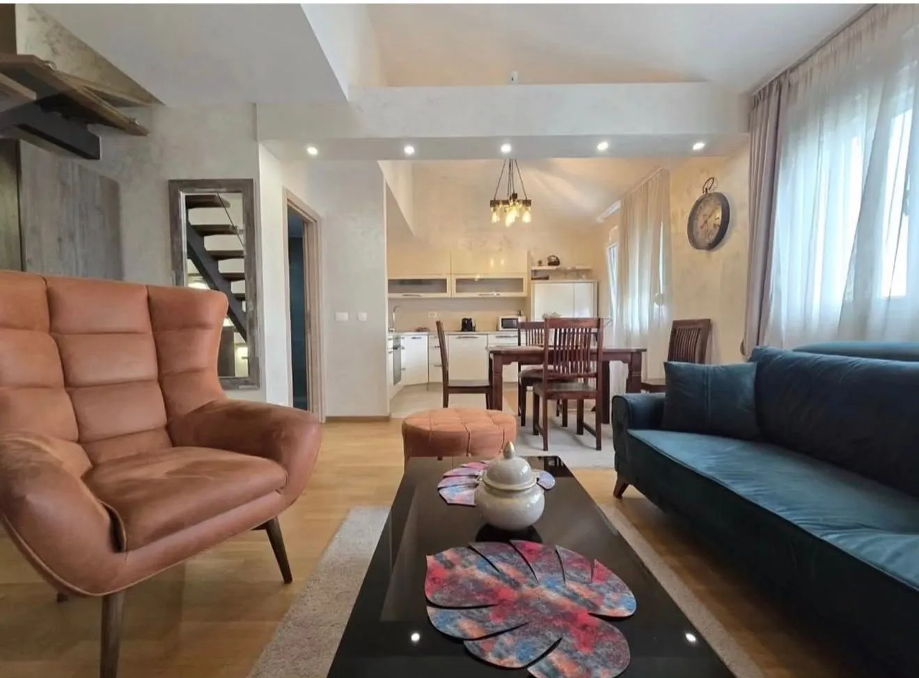 Spacious living room connected to the dining area and kitchen.