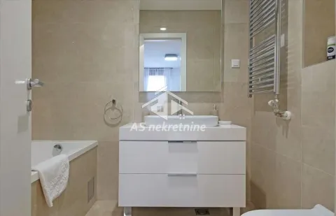 Modern bathroom with a washbasin, mirror and bathtub. - image 20