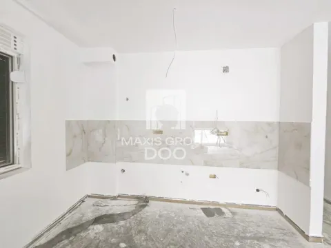Empty space under construction with wall tiles installed for a kitchen. - image 4