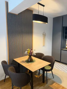 Dining table with chairs as part of a modern kitchen. - image 5