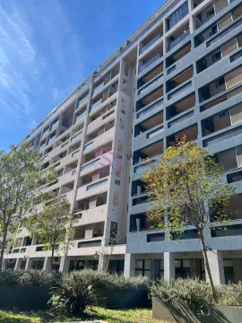 View of a modern residential building with balconies and a landscaped yard. - image 2