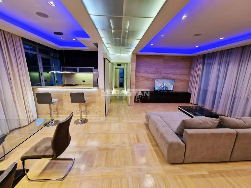 Spacious living room with a sofa set and dining area.