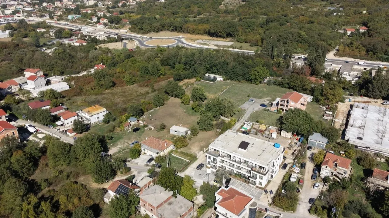 Aerial view of the surrounding area and buildings in the settlement.