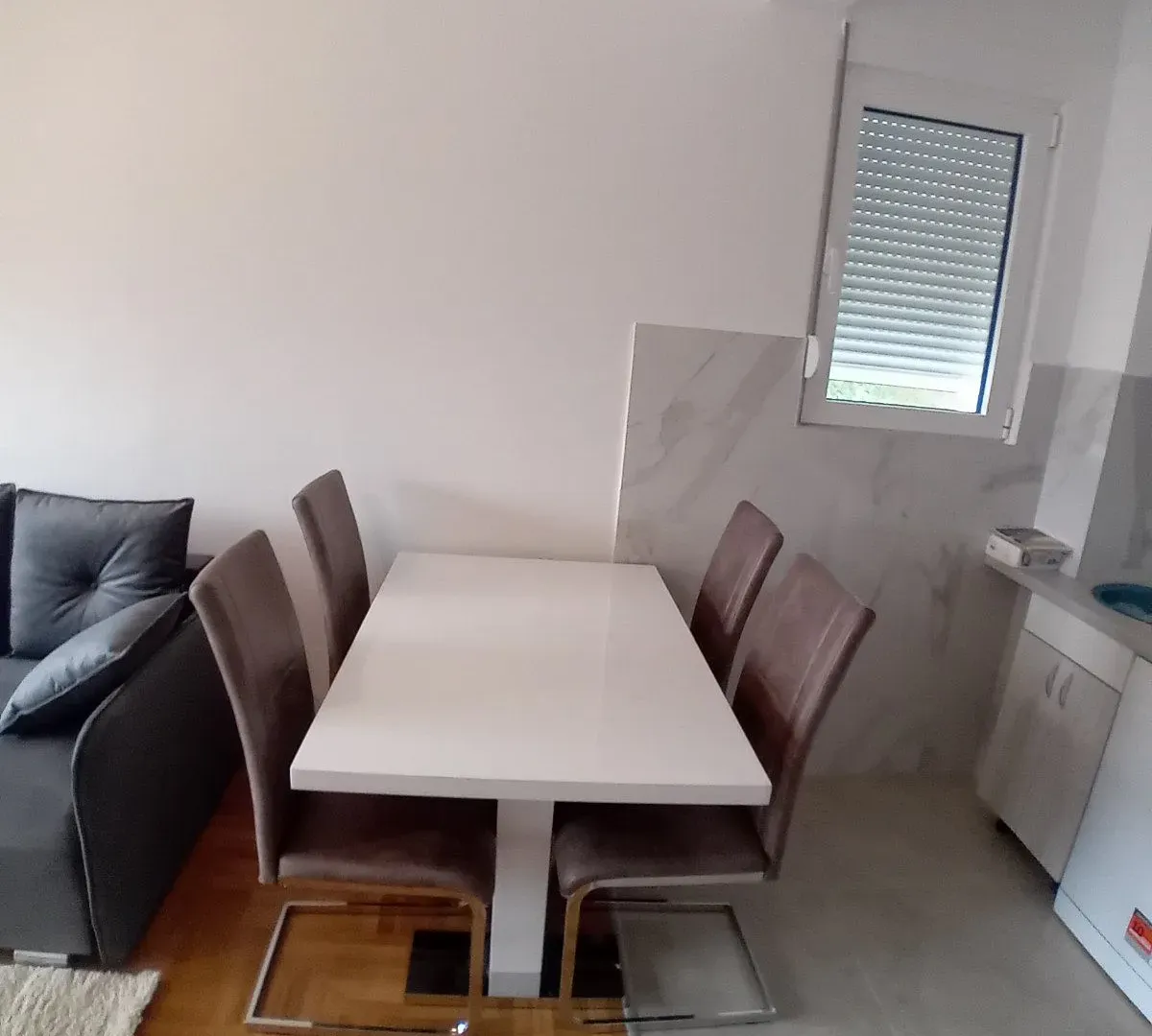 Living room with a dining table and chairs.