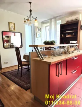 Kuhinja sa šankom i trpezarijom u nastavku. - image 4