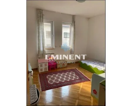 Children's bedroom with a bed, windows, and parquet flooring. - image 10