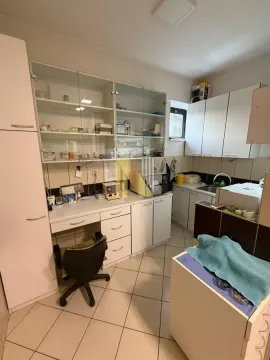 Working space with kitchen cabinets and display cases. - image 3