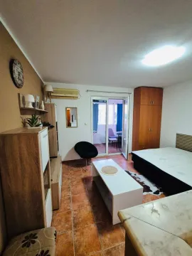 Furnished bedroom with a bed, wardrobe, and access to the terrace. - image 3