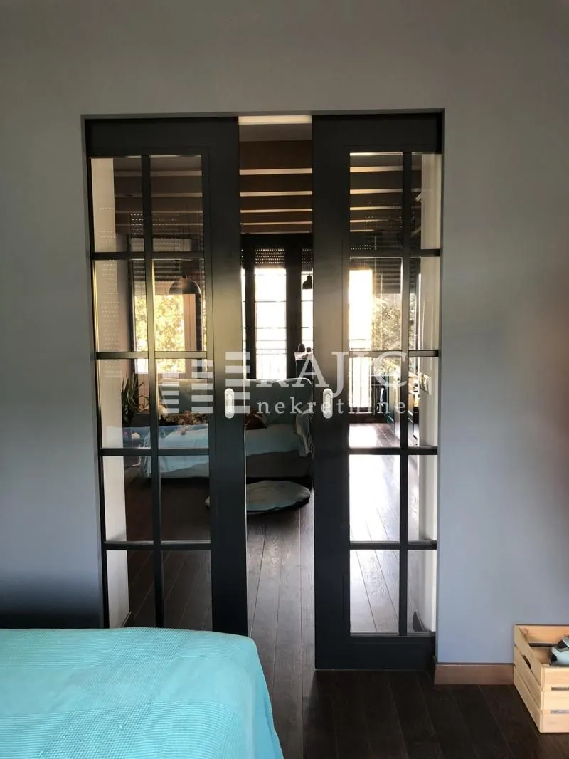 View through glass doors into the living room.