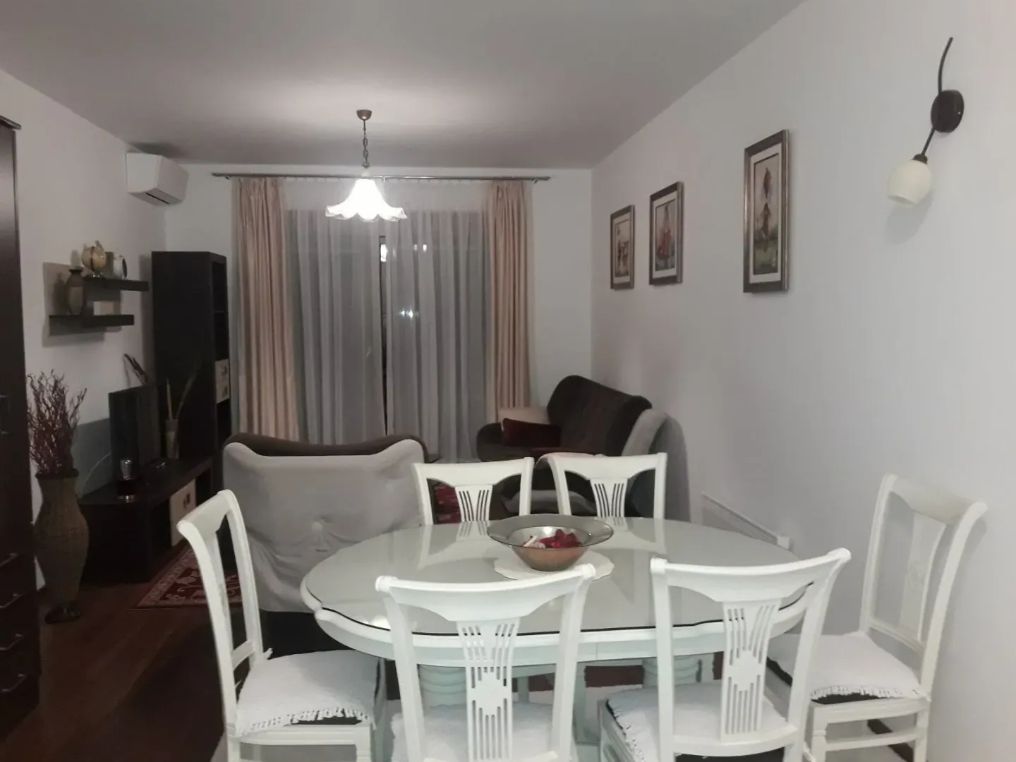 Bright living room with a dining table and seating area.