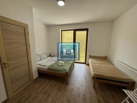 Bedroom with a double bed and an additional single bed. - image 30