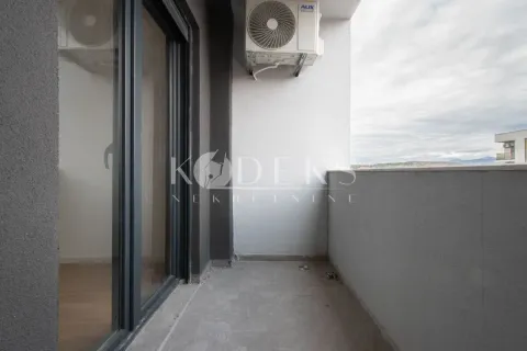 Unfurnished balcony with an outdoor air conditioning unit and sliding balcony doors. - image 5