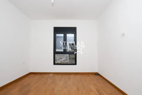 Empty unfurnished room with white walls and a wooden floor. - image 3