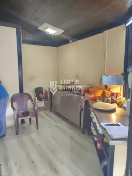 Kitchen equipped with stainless steel work surfaces and kitchen units. - image 2