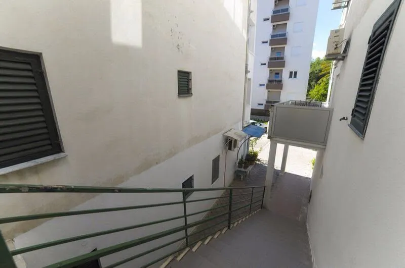 Exterior stairs and passageway between buildings.